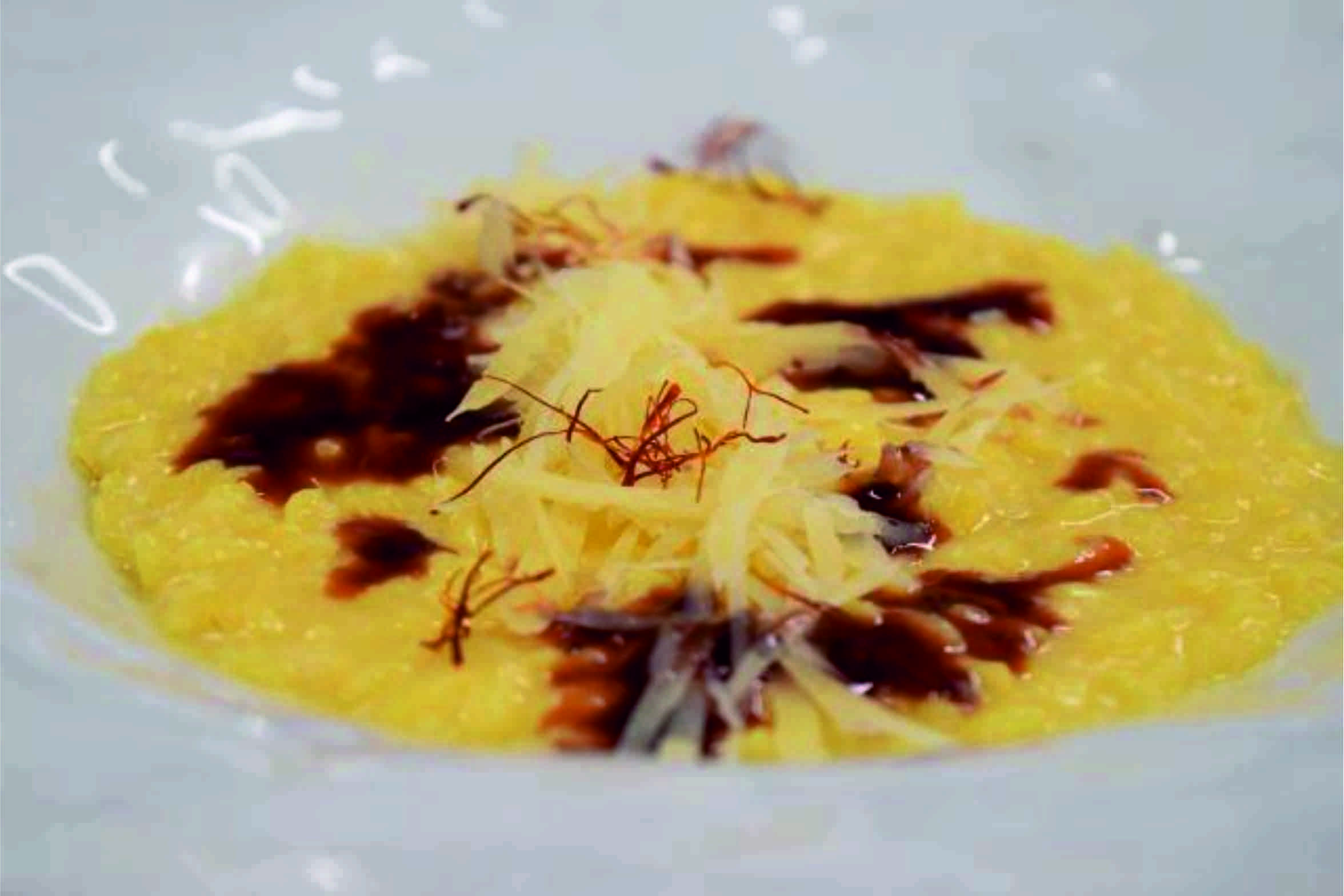 Risotto mantecato al silter riduzione di vino e zafferano